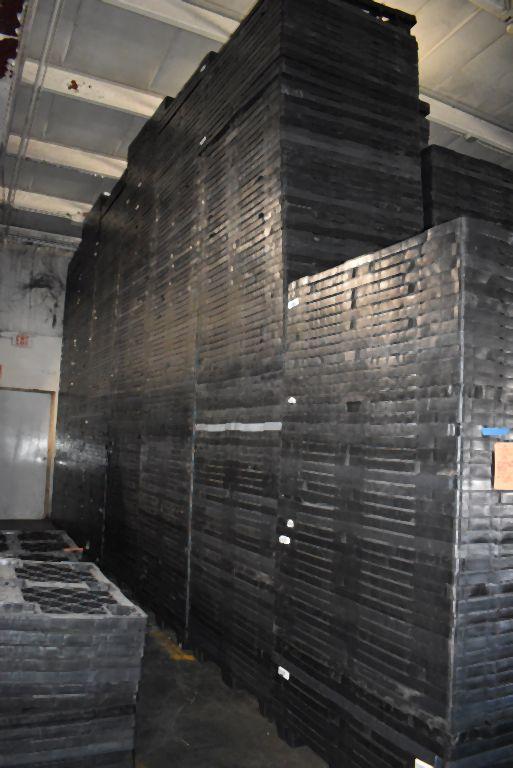 (7) COLUMNS OF NESTING PLASTIC PALLETS,