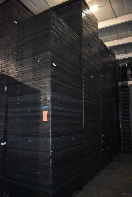 (6) COLUMNS OF NESTING PLASTIC PALLETS,