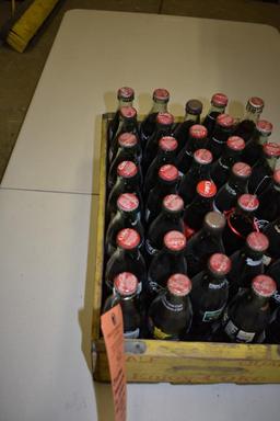 24 UNOPENED COMMERATIVE 8 OZ BOTTLES OF COKE