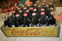 24 UNOPENED COMMERATIVE 8 OZ BOTTLES OF COKE