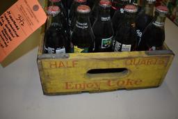 24 UNOPENED COMMERATIVE 8 OZ BOTTLES OF COKE