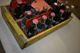 24 UNOPENED COMMERATIVE 8 OZ BOTTLES OF COKE
