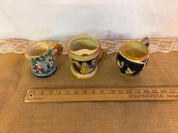 GERMAN MUSTACHE STEIN 4"D X 4 1/8"H AND (2) MISC MUGS