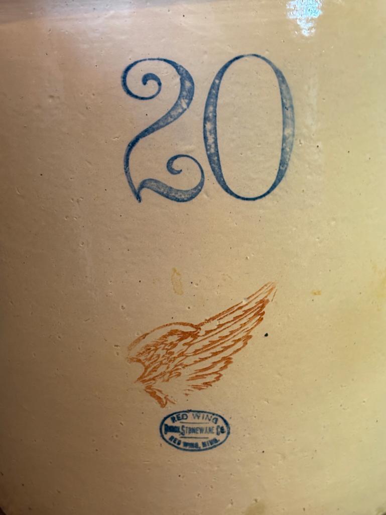 20 GALLON RED WING CROCK, WING IS APPROX 5" ACROSS, 20.5" TALL, LID IS MARKED "20' AND IS