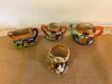 VINTAGE CREAMERS, COTTAGE HOUSE, POTTERY WITH SMALL SKUNK FIGURE