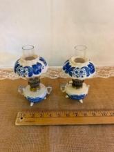 (2) MATCHING VINTAGE BLUE & WHITE OIL LAMPS, 7 1/2"H-- ONE LAMP HAS BROKEN HANDLE