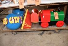 CONTENTS ON LOWER SHELF: KID CITY SIGNAGE GLOVE & TRAIN PARTS