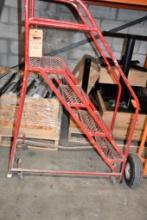 RED ROLLING 4 STEP STEP LADDER, 53"H X 35"D X 18"W