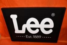 LEE ADVERTISING SIGN, BLACK W/WHITE LETTERS, 3' X 27"