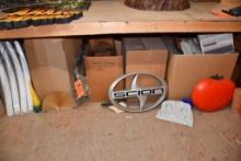 LARGE ASSORTMENT OF DISPLAY ITEMS ON FLOOR: SURF BOARDS, TIPS, SIGNS & MISC.