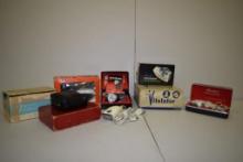 BIN WITH LARGE LOT OF VINTAGE ELECTRIC SHAVERS, LIKE NEW, IN BOXES! WAHL, NORELCO, AND MORE
