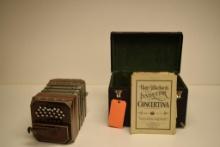ANTIQUE CONCERTINA WITH CASE AND BEGINNERS INSTRUCTION BOOK