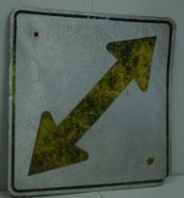 (2) VINTAGE ALUMINUM DIRECTION ARROW AND ROAD SIGN, RETIRED