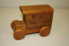 MILWAUKEE SENTINEL WOODEN TRUCK COIN BANK, MADE BY TOYSTALGIA, INC., 1985
