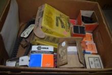 BOX OF MISC VINTAGE AUTOMOTIVE PARTS, 1929-31 CADILLAC V8 TIMING CHAIN, MISC. IGNITION PARTS,