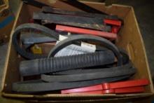 BOX OF MISC. VINTAGE BATTERY HOLD DOWNS, FAN BELTS, RADIATOR HOSE