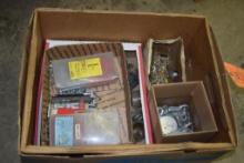 BOX OF MISC VINTAGE AUTOMOTIVE FUEL FILTERS AND MISC HARDWARE