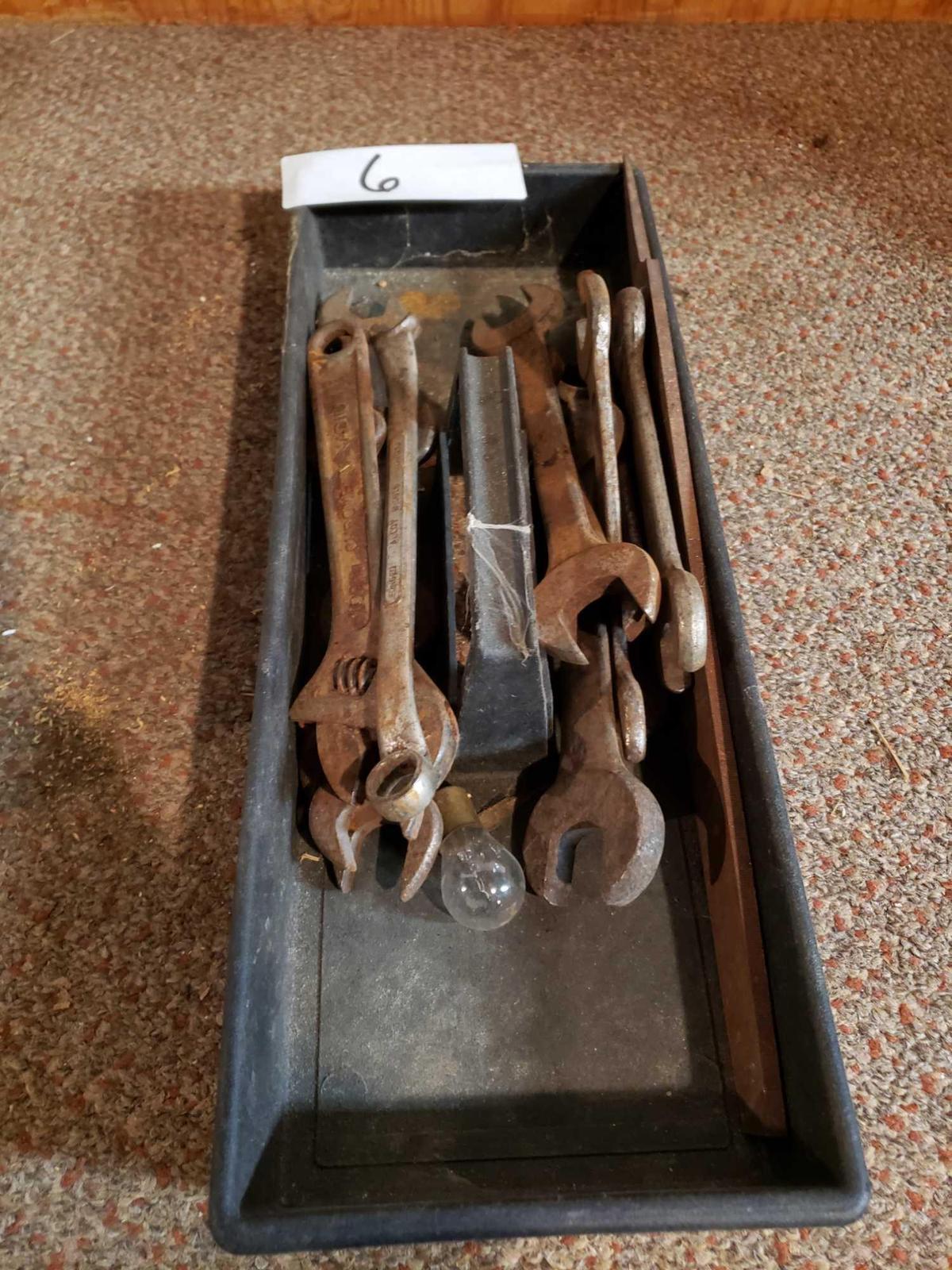 Tray of crescent wrenches and open end wrenches