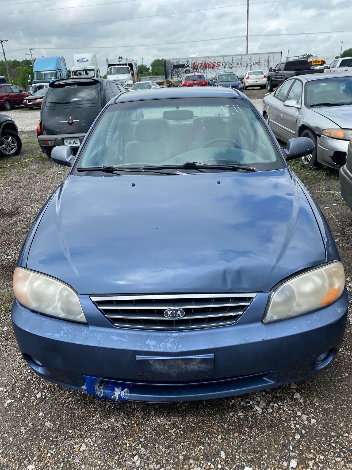 E11 2003 Kia Spectra KNAFB121735302468 Police