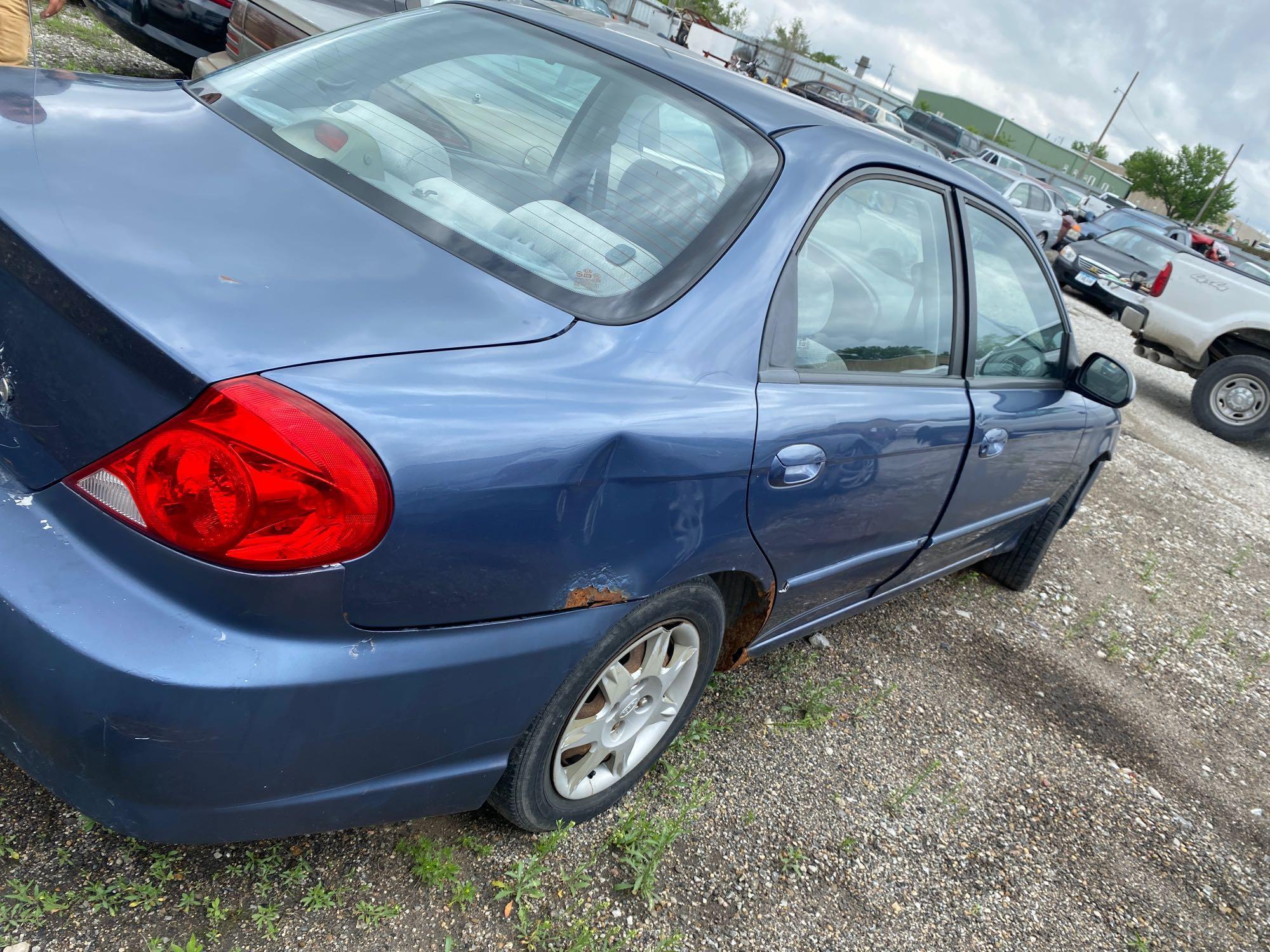 E11 2003 Kia Spectra KNAFB121735302468 Police