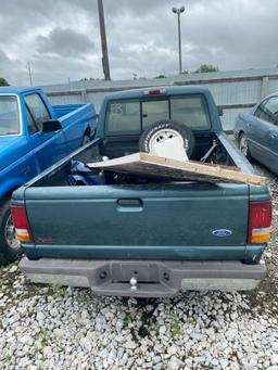 E03 1997 Ford Ranger 1FTCR14A8VPA17266 Green Police