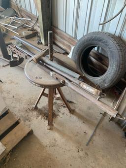 Tire changer unit with equipment is bolted to the ground