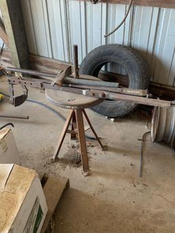 Tire changer unit with equipment is bolted to the ground