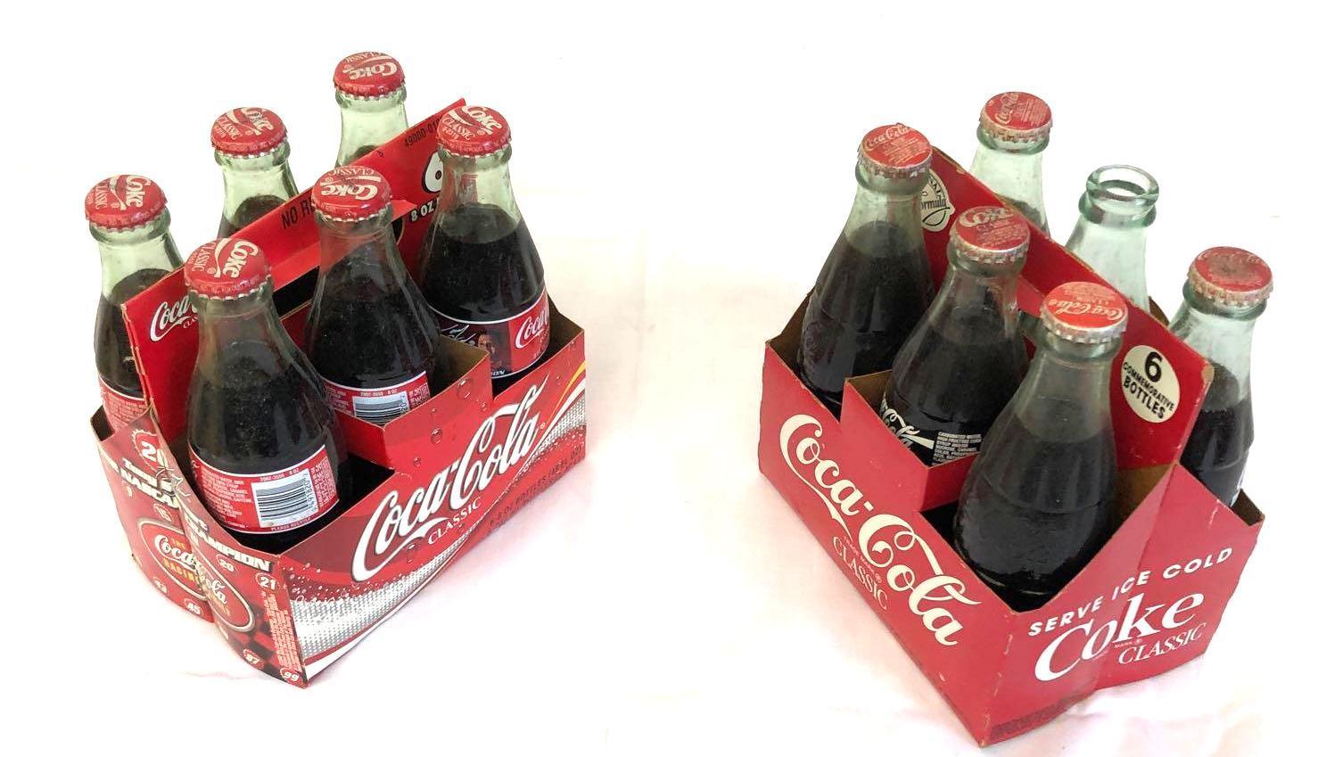 2 six pack Coca-Cola classic bottles