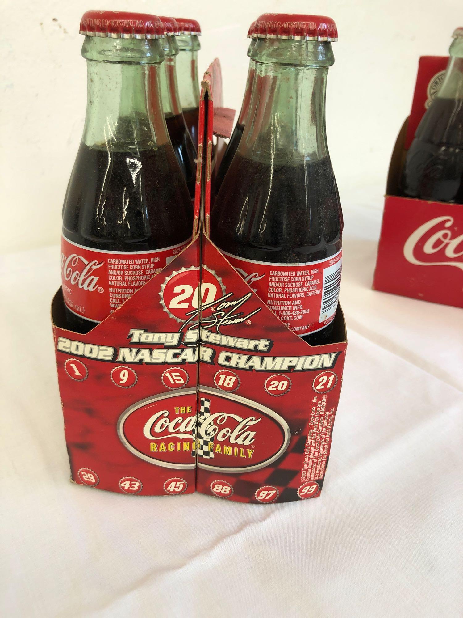 2 six pack Coca-Cola classic bottles