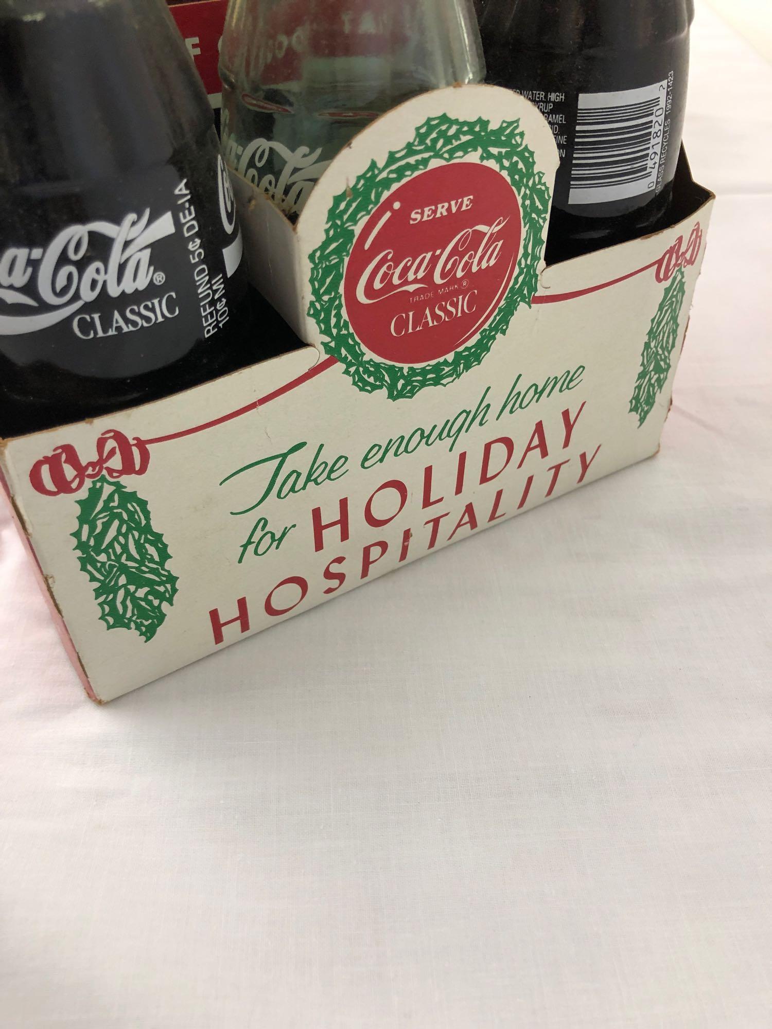 2 six pack Coca-Cola classic bottles