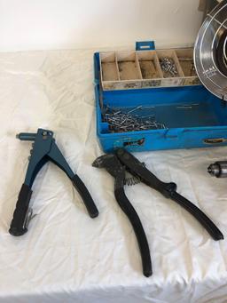 Rivet guns, drill missing plug in and Mr. Heater