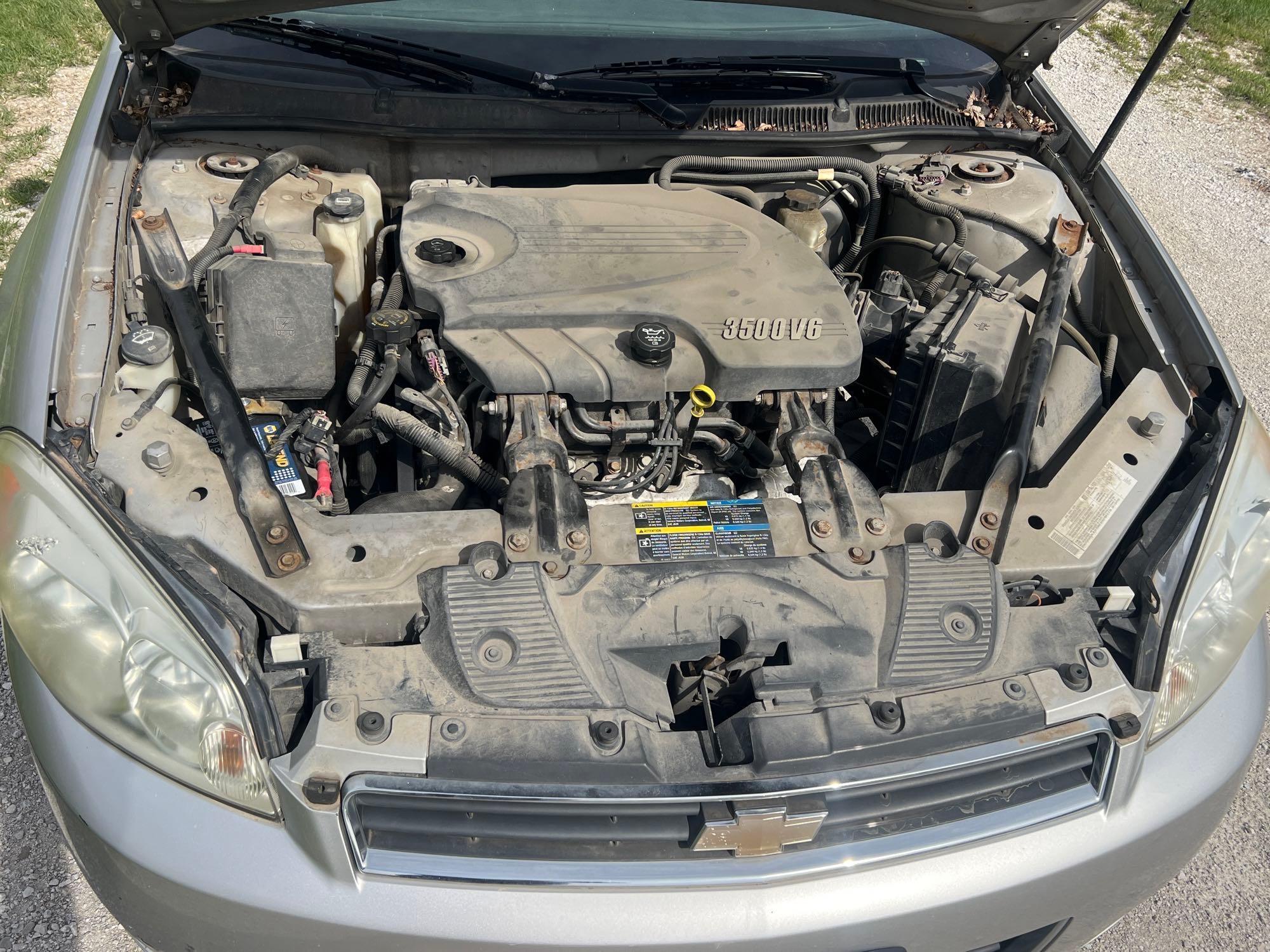 2006 Chevy Impala LT with 82,0XX miles v6 runs and drives see description