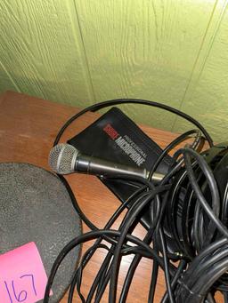 microphone with floor, stand cords, other electronics