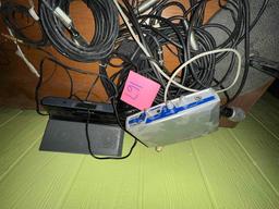 microphone with floor, stand cords, other electronics