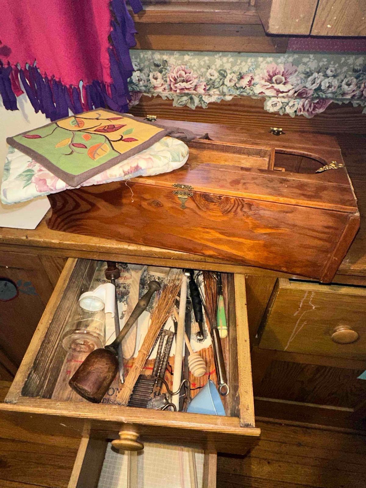 Drawer contents and jewelry box taken apart.