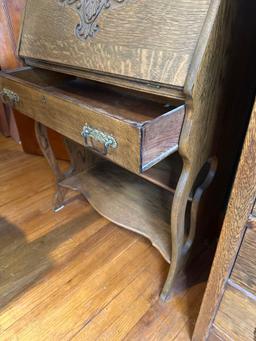 small wooden drop down desk with all contents