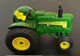 1/43rd Ertl John Deere 630 LP tractor