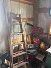 trap and yard tools, and wooden ladder
