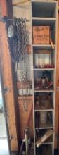 shelf full of miscellaneous items, including chains