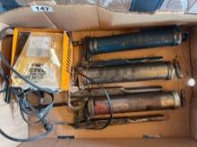 Grease guns and battery charger