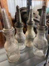 four glass oil fillers