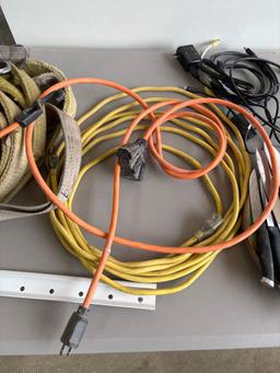 Tow straps, extension cord, knives, plus