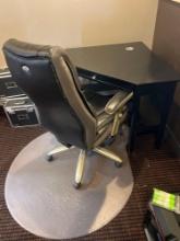 corner desk with nice office chair and floor mat