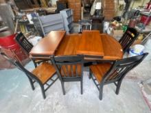 6 chairs and Table with 2 leaves 80inches long without leave in