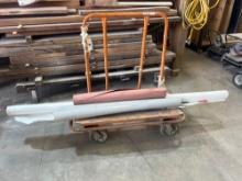 drywall cart with house wrap and paper
