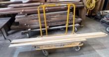 drywall cart with pieces of wood