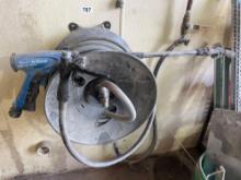Pressure washer hose, hose reel and nozzle