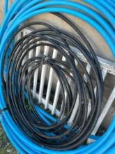 2 Rolls of garden hoses