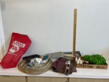 Hand saw, knife sharpener, engine oil and more