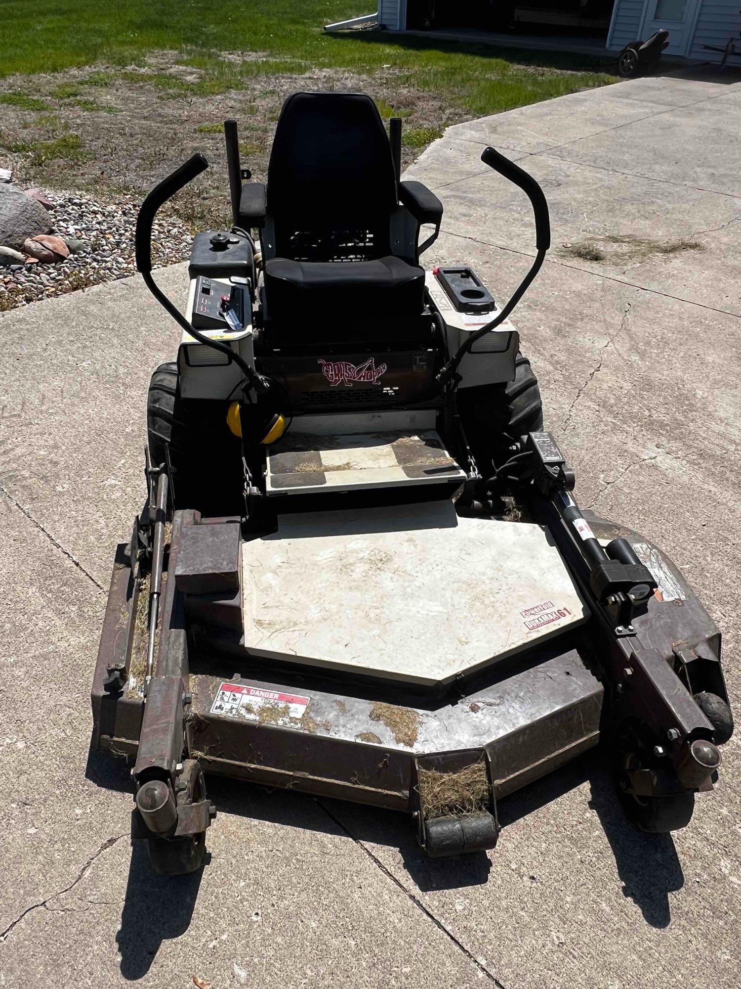 Grasshopper 727k zero turn with 61 inch deck and 887 hours runs and operates good